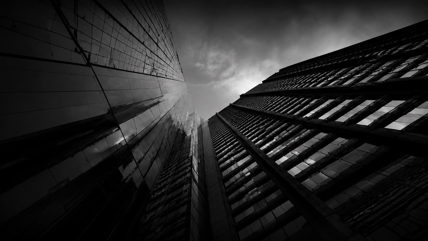 Looking up at a modern high-rise office tower